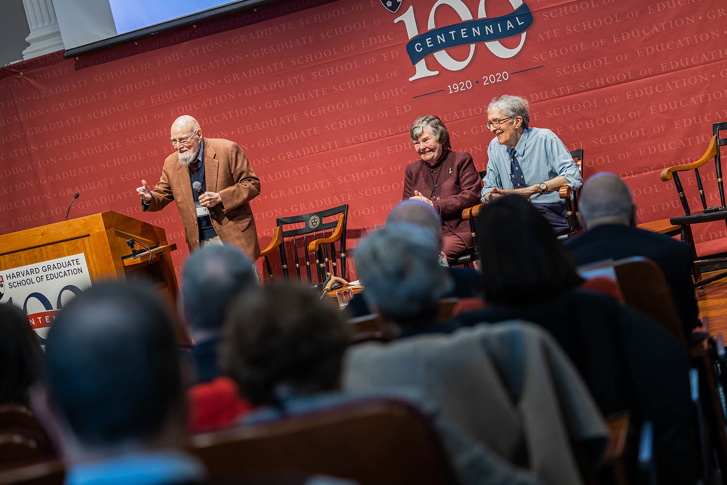 Robert LeVine on stage with Patricia Albjerg Graham and Howard Gardner