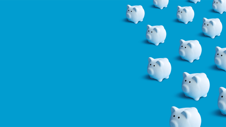 Piggy banks on blue background